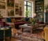 Tasteful maximalist living room, layered framed artwork, burgundy sofa, patterned rug, coordinated teal and ochre accents